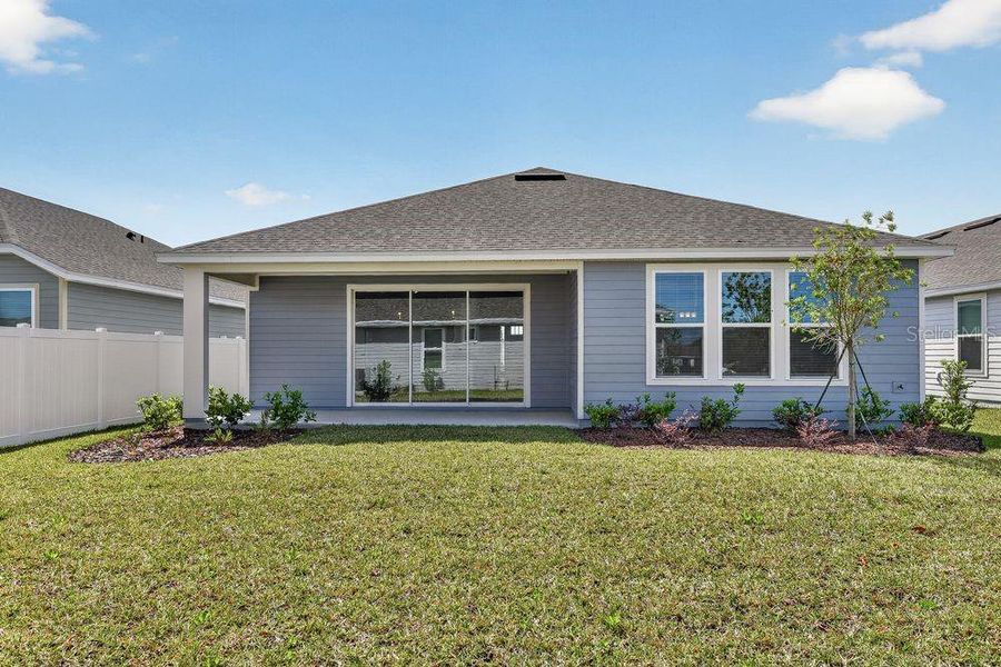 Exterior details and patio area of a home in Colbert Landings, Palm Coast (Image 21).