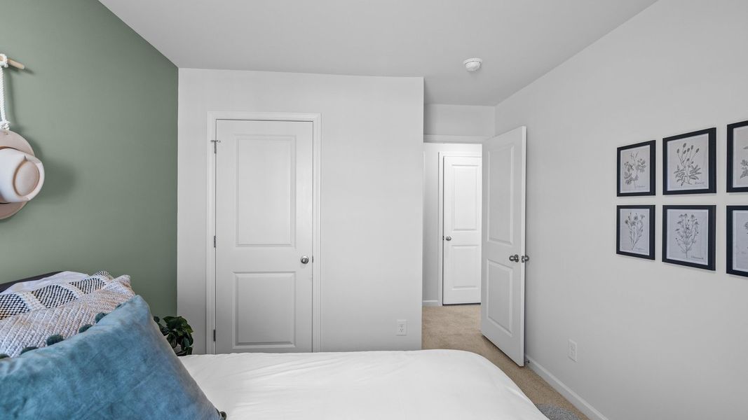 Furnished interior view inside a new home in The Townes at Ridgewood Farms, Winterville (Image 25).