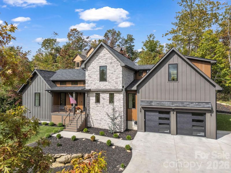 Front exterior of a new home in , Hendersonville, NC, highlighting curb appeal (Image 25).