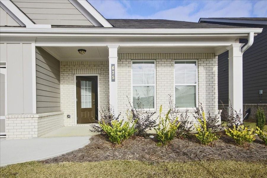Exterior details and patio area of a home in Cooper's Walk, Loganville (Image 3).