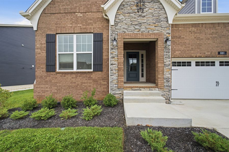 Exterior details and patio area of a home in The Retreat at Norman Farm, Hendersonville (Image 3).