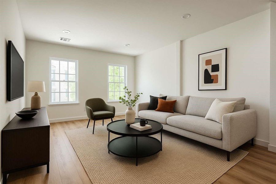 Living room off front entry. Virtually staged.