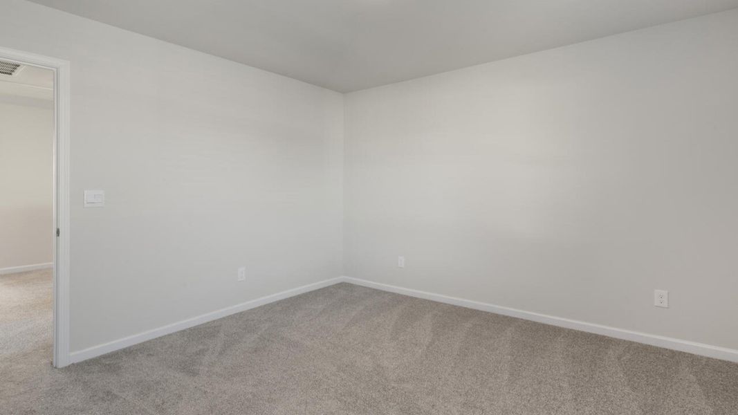 Spacious, unfurnished interior of a new home in The Preserve at Tidewater, Sneads Ferry (Image 42).