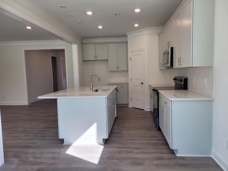 Furnished interior view inside a new home in 1158 Place, Wilson (Image 7).