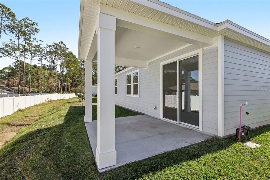 Exterior details and patio area of a home in , Palm Coast (Image 21).