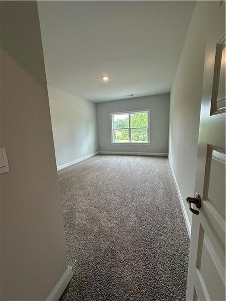 Spacious, unfurnished interior of a new home in Mirror Lake at South Harbour, Villa Rica (Image 12).
