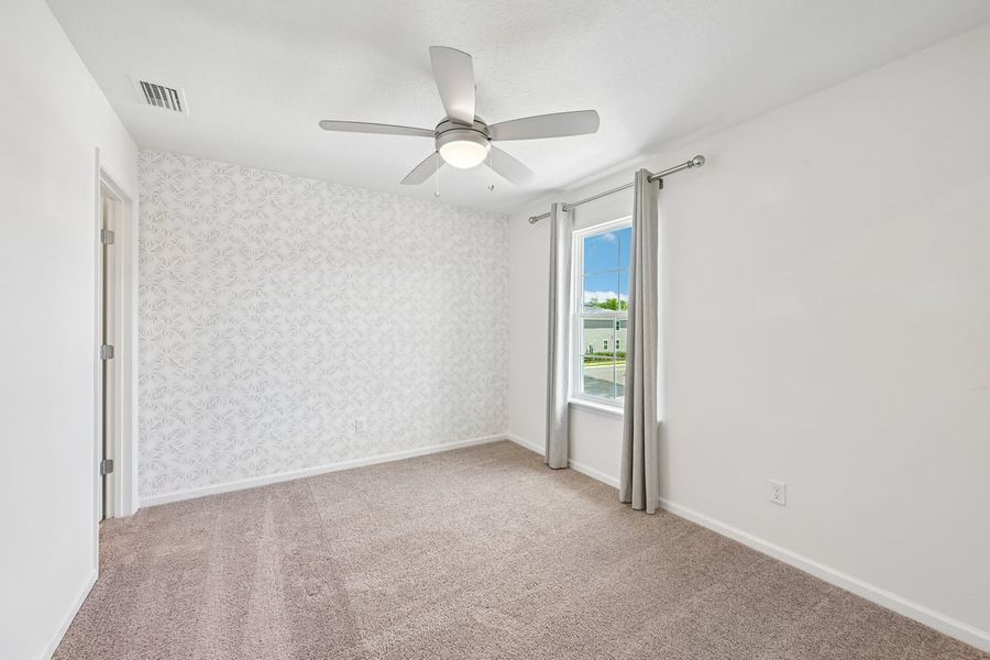 Spacious, unfurnished interior of a new home in Orchard Park Townhomes, St. Augustine (Image 18).