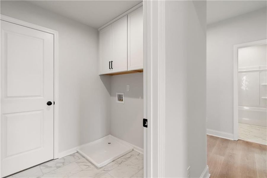 Spacious, unfurnished interior of a new home in The Paddocks at Doc Hughes, Buford (Image 34).