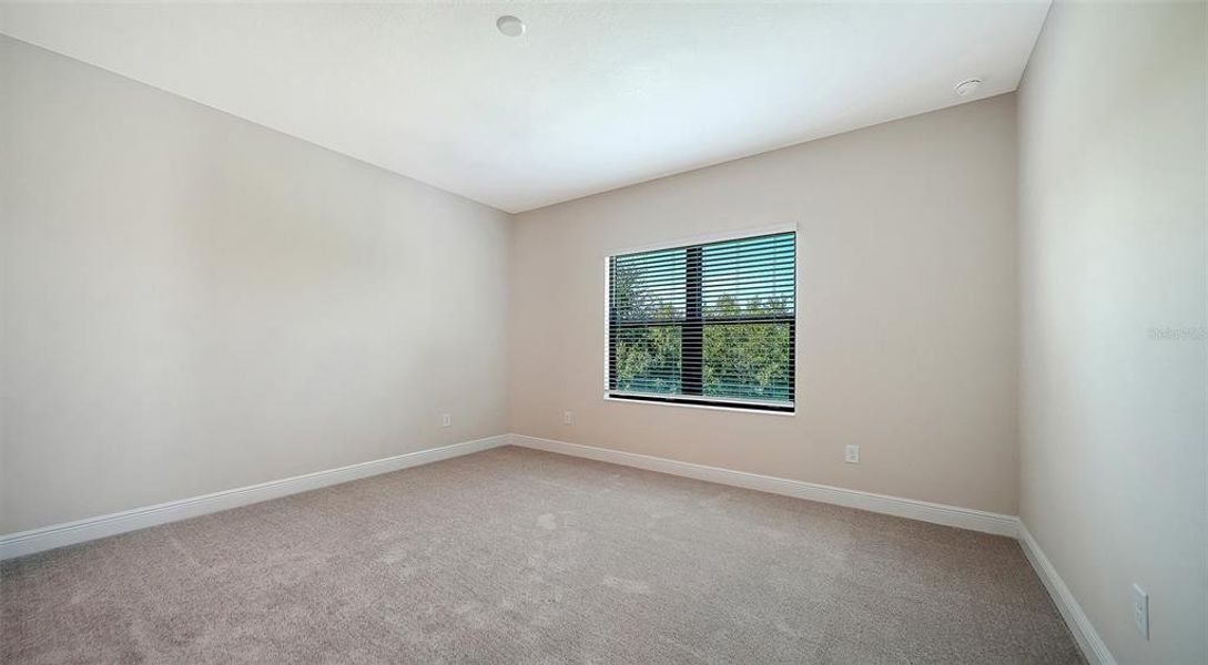 Spacious, unfurnished interior of a new home in Vicenza Real Estate and Homes for Sale in North Venice, FL - Neal Communities, Nokomis (Image 24).