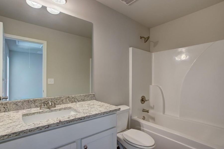 Furnished interior view inside a new home in Sutton's Landing, Statham (Image 12).