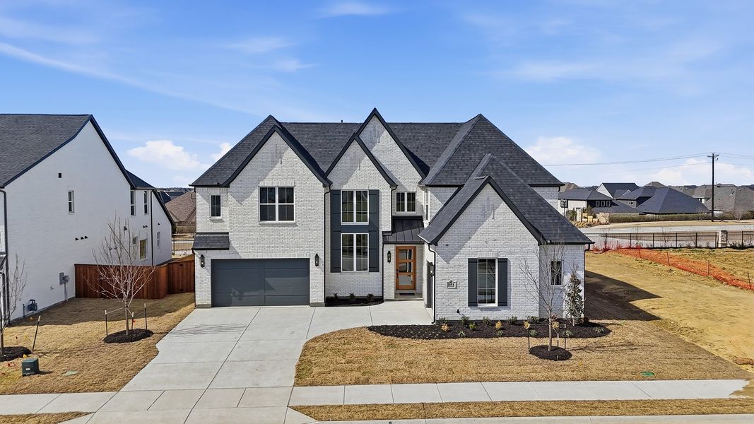 Front exterior of a new home in Park Place - 80' Lots, Prosper, TX, highlighting curb appeal (Image 19). Front exterior of a new home in Park Place - 80' Lots, Prosper, TX, highlighting curb appeal (Image 19).