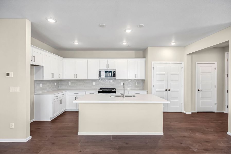 Furnished interior view inside a new home in Barefoot Village, Firestone (Image 3).