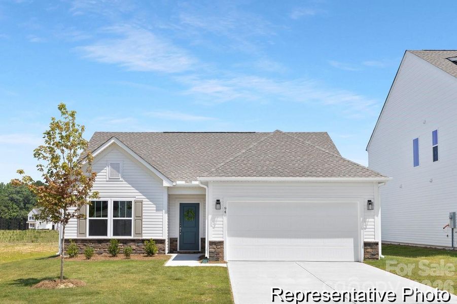 Front exterior of a new home in , Oakboro, NC, highlighting curb appeal (Image 1). Front exterior of a new home in , Oakboro, NC, highlighting curb appeal (Image 1).
