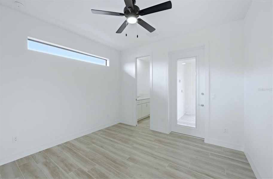 Spacious, unfurnished interior of a new home in , Port Charlotte (Image 27).