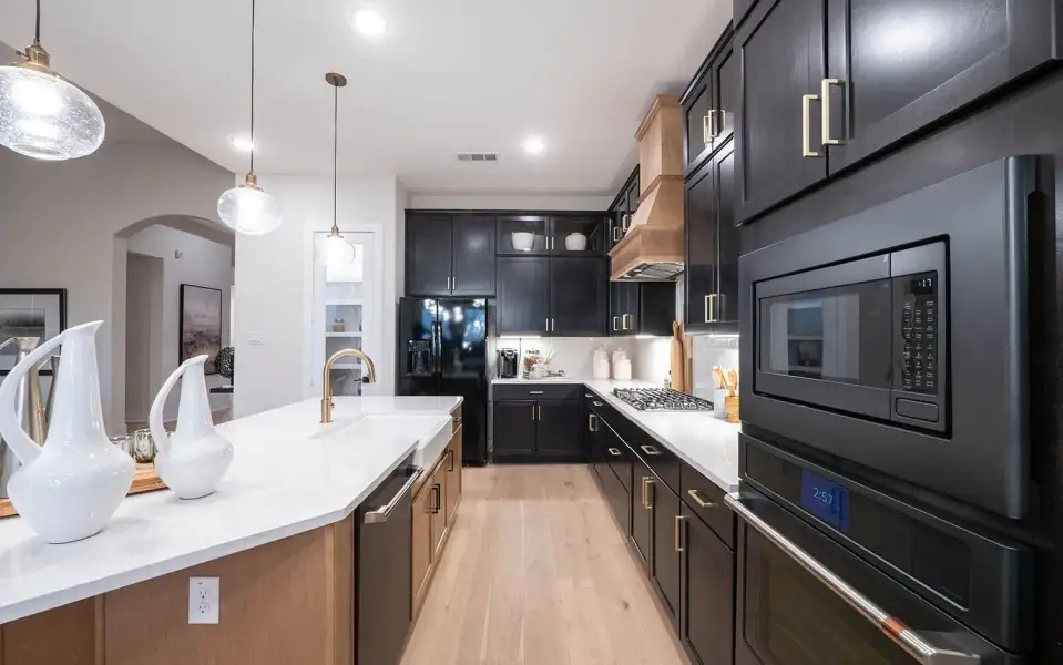 Representative furnished interior of a home built from the Malibu by CastleRock Communities in Lakesong, Grand Prairie (Image 12).