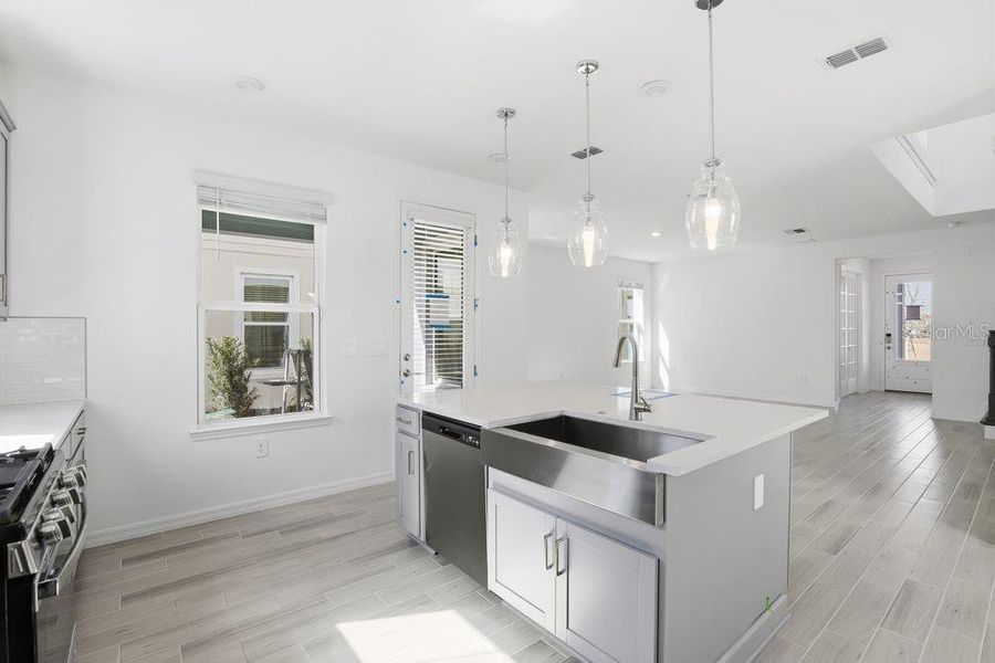 Furnished interior view inside a new home in Harvest at Ovation, Winter Garden (Image 11).