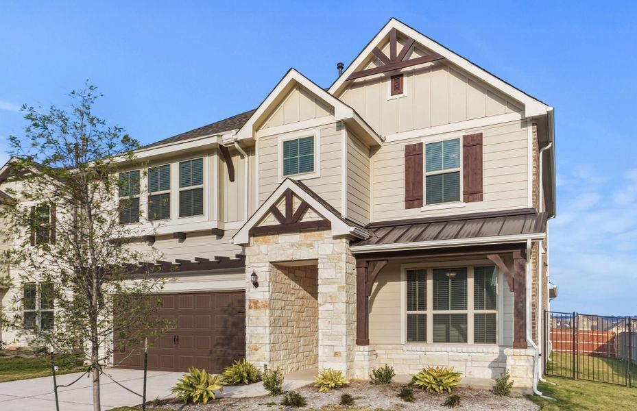 Front exterior of a new home in Saddleback at Santa Rita Ranch, Liberty Hill, TX, highlighting curb appeal (Image 23). Front exterior of a new home in Saddleback at Santa Rita Ranch, Liberty Hill, TX, highlighting curb appeal (Image 23).