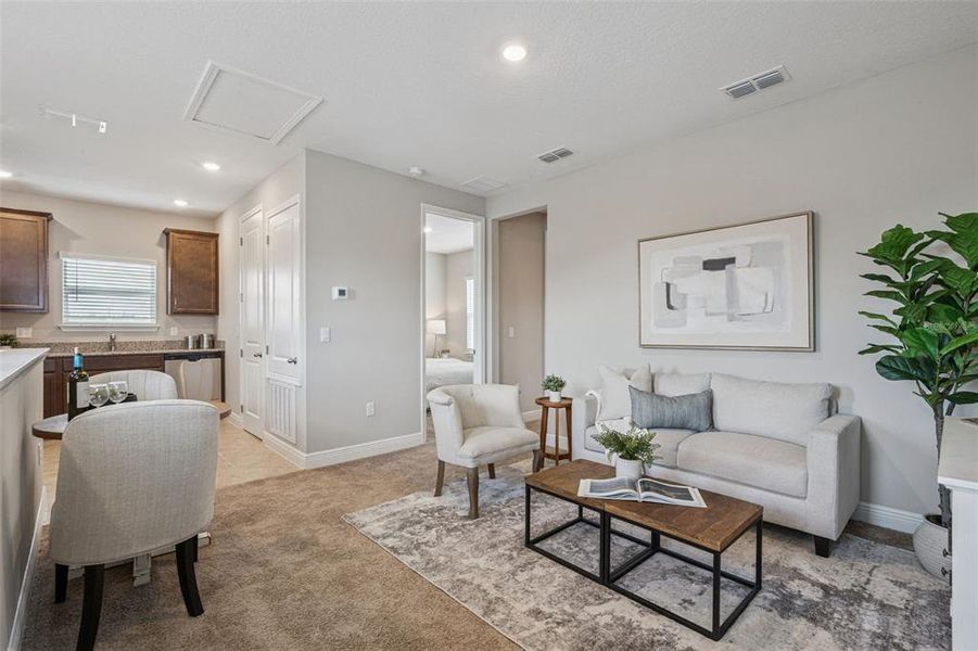 Furnished interior view inside a new home in Laureate Park, Orlando (Image 11).