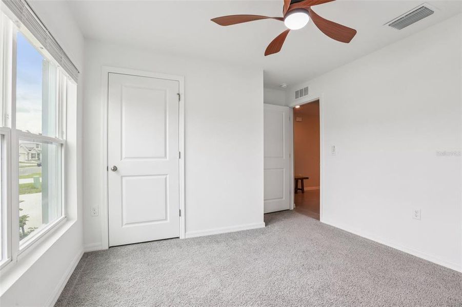 Spacious, unfurnished interior of a new home in North Park Isle, Plant City (Image 22).