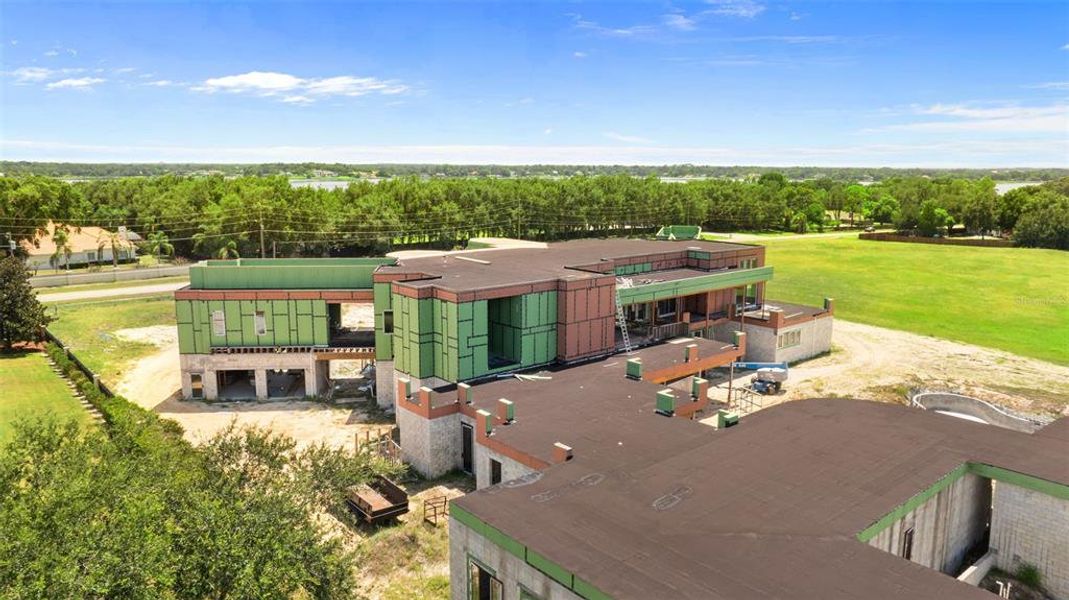Front exterior of a new home in , Windermere, FL, highlighting curb appeal (Image 6).