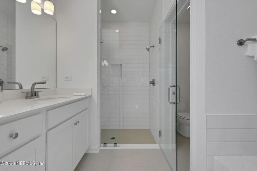 Furnished interior view inside a new home in Seminole Trace, Palm Coast (Image 13).