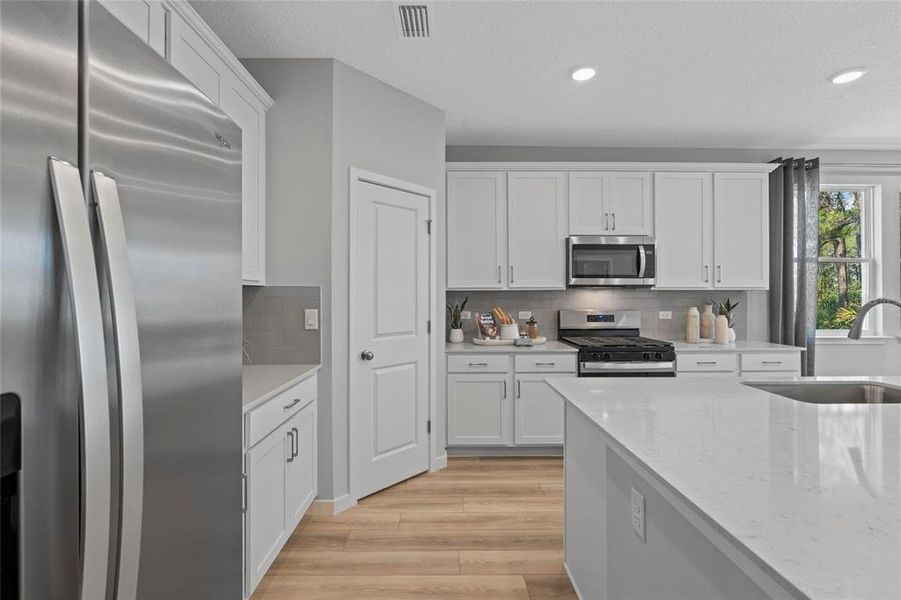 Furnished interior view inside a new home in Reserve East, Flagler Beach (Image 8).