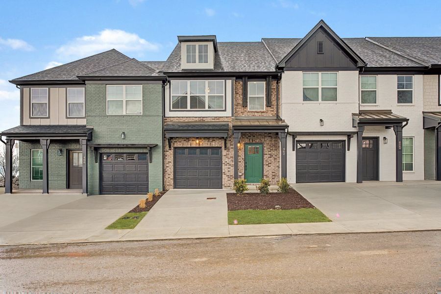 Front exterior of a new home in Oxford Station, Gallatin, TN, highlighting curb appeal (Image 29).