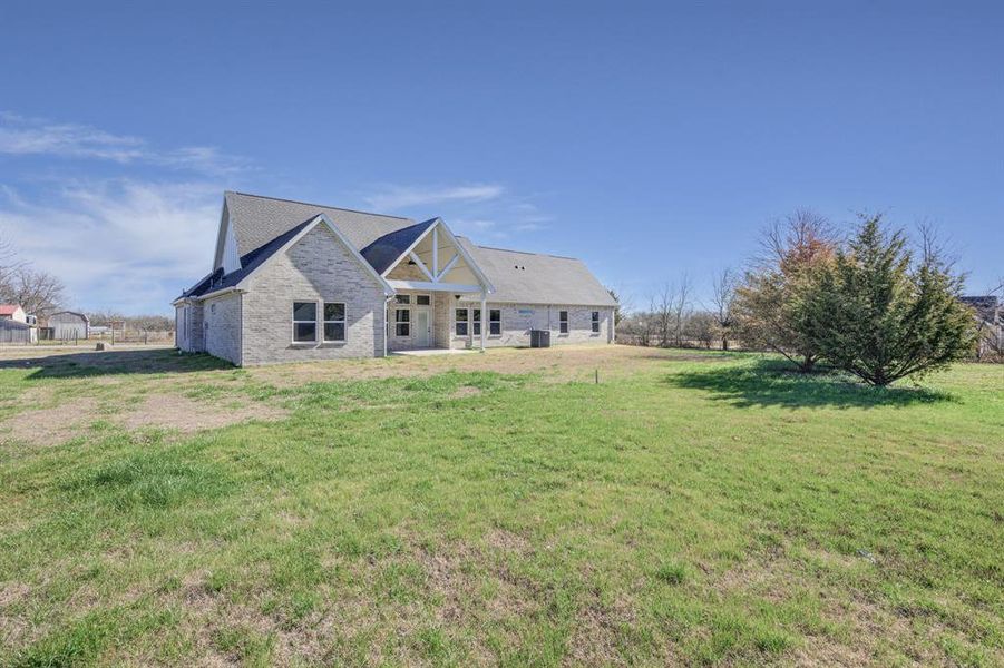 Exterior details and patio area of a home in , Farmersville (Image 4).