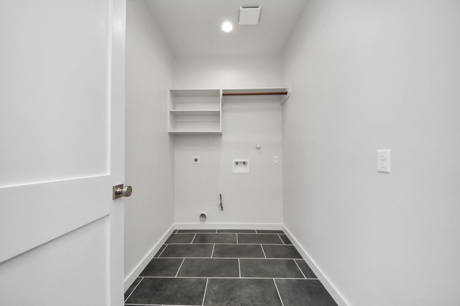 upstairs laundry room. near the primary bedroom upstairs laundry room. near the primary bedroom