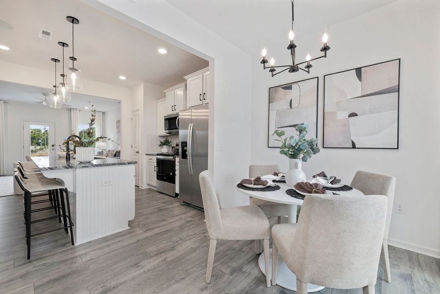 Representative furnished interior of a home built from the Miles II TH by True Homes in Ardmore Townhomes, Winston-Salem (Image 12).