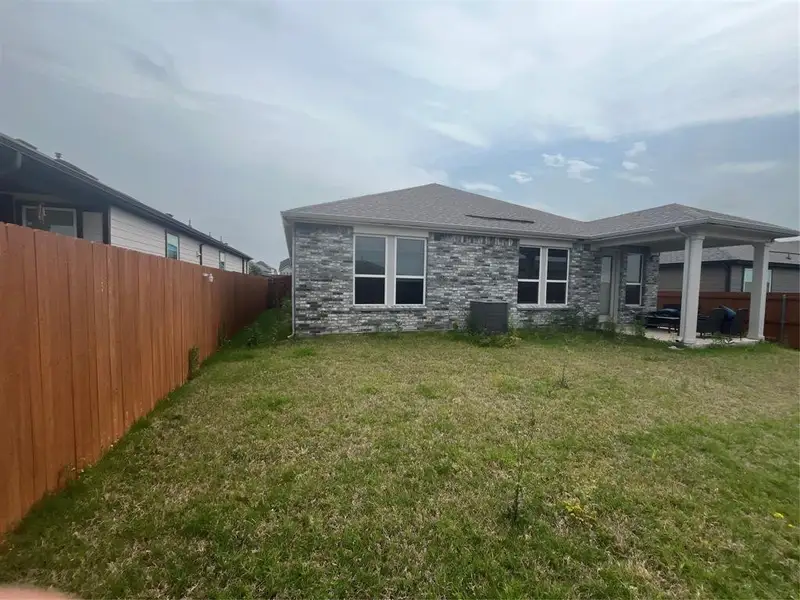 Exterior details and patio area of a home in , Crandall (Image 3).