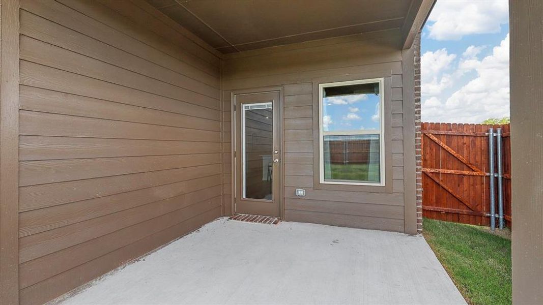 Exterior details and patio area of a home in Stonewyck Farms, Ennis (Image 3). Exterior details and patio area of a home in Stonewyck Farms, Ennis (Image 3).