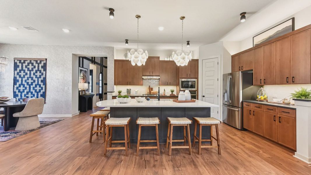 Representative furnished interior of a home built from the Peyton by Chesmar Homes in The Grove at Blackhawk, Pflugerville (Image 12).
