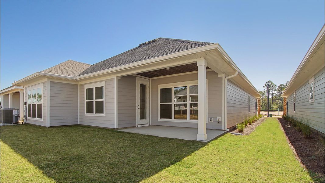 Representative exterior photo of a completed home built from the Lily by D.R. Horton in Breakfast Point East Phase II, Panama City Beach, FL (Image 23).