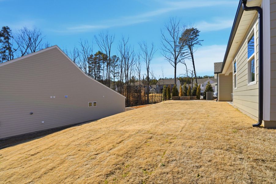 Exterior details and patio area of a home in Rone Creek, Waxhaw (Image 38).