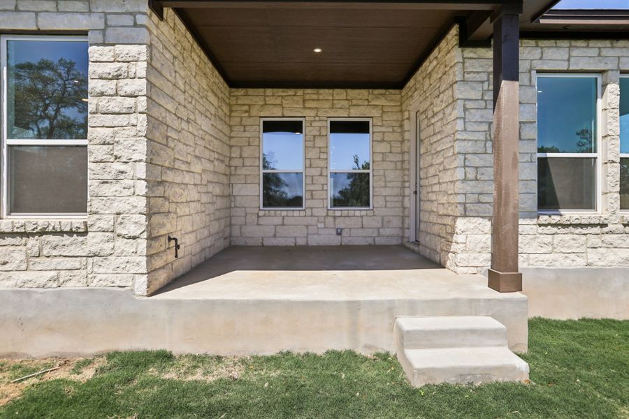 Exterior details and patio area of a home in Persimmon, Buda (Image 3).