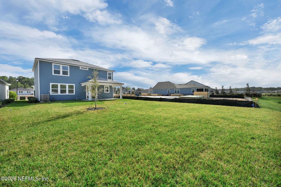 Exterior details and patio area of a home in Hyland Trail, Green Cove Springs (Image 21).