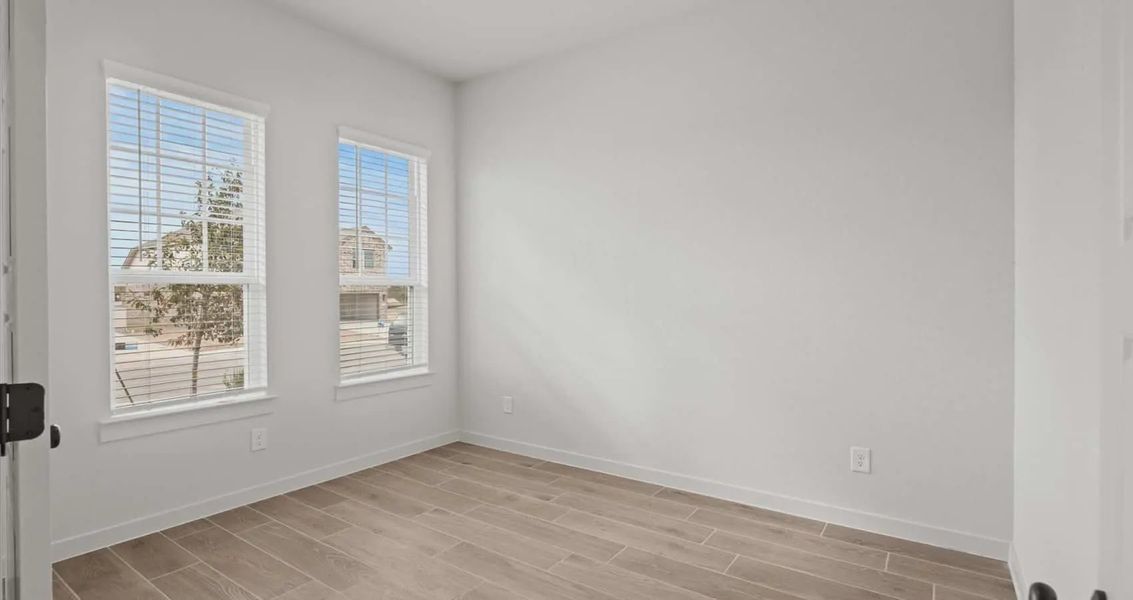Representative unfurnished interior of a home built from the Rhyan by Chesmar Homes in Stream Waters, Buda (Image 8).
