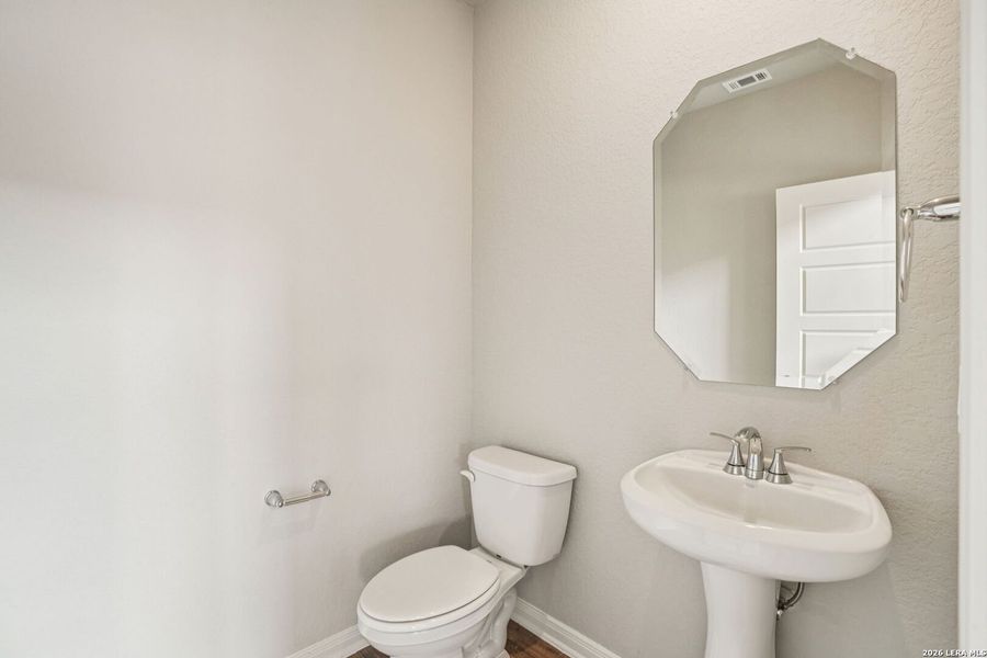 Furnished interior view inside a new home in Estancia Ranch - Classic Series, San Antonio (Image 14).