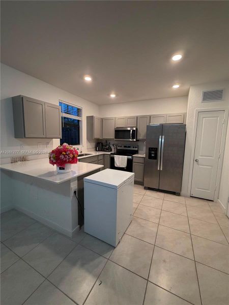 Furnished interior view inside a new home in , Florida City (Image 6).