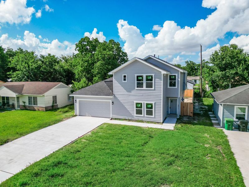 Front exterior of a new home in , Houston, TX, highlighting curb appeal (Image 22).