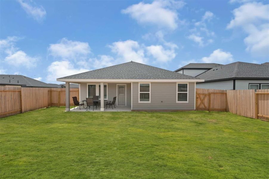 Exterior details and patio area of a home in Tamarron, Fulshear (Image 2).