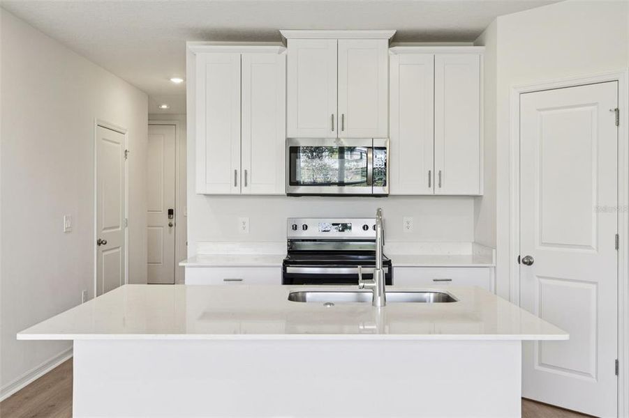 Furnished interior view inside a new home in The Reserve at Hammock Oaks Townes, Lady Lake (Image 11).