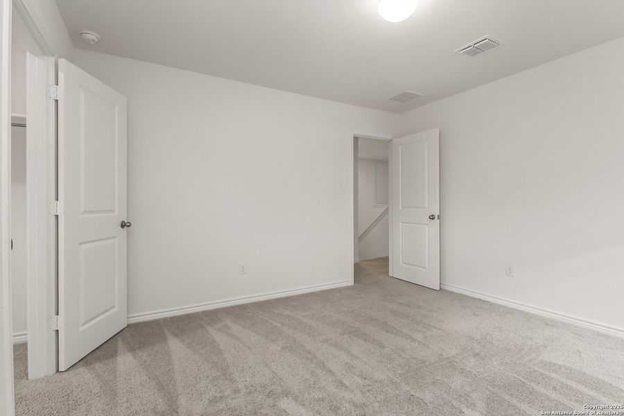Spacious, unfurnished interior of a new home in Cove at Westover Hills, San Antonio (Image 18).