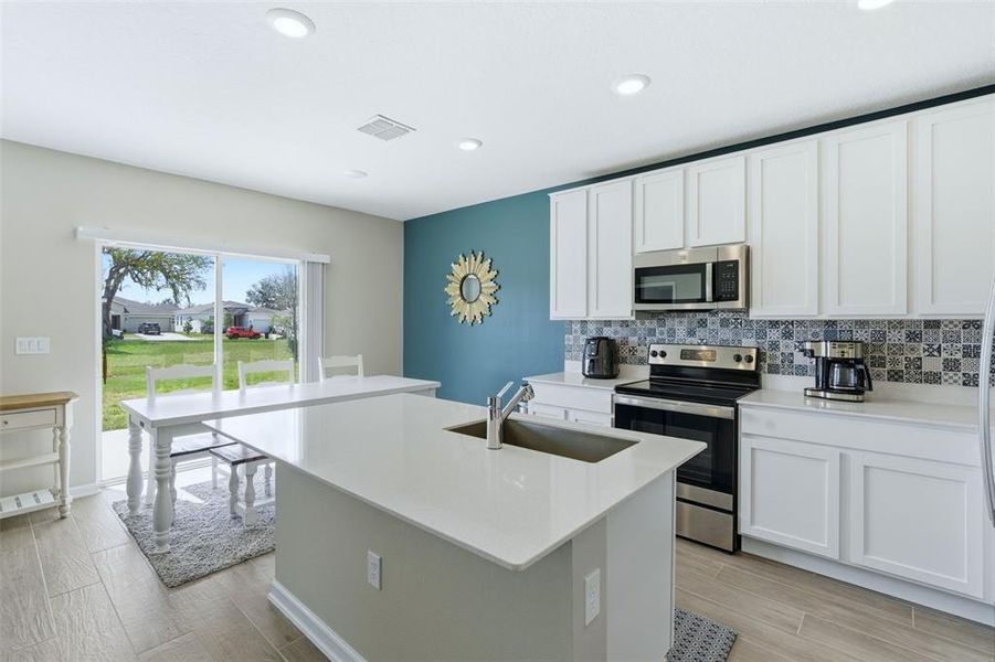 Furnished interior view inside a new home in Vineland Reserve, Osteen (Image 16).