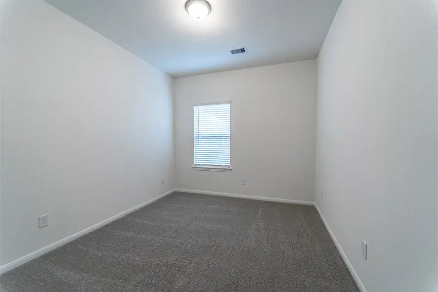 Spacious, unfurnished interior of a new home in Windrose Green, Angleton (Image 22).