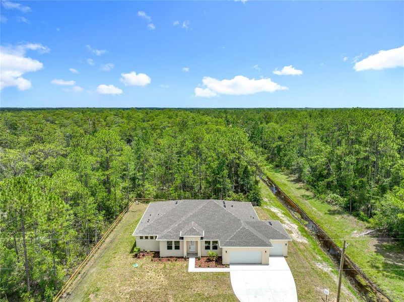 Front exterior of a new home in , Orlando, FL, highlighting curb appeal (Image 27). Front exterior of a new home in , Orlando, FL, highlighting curb appeal (Image 27).