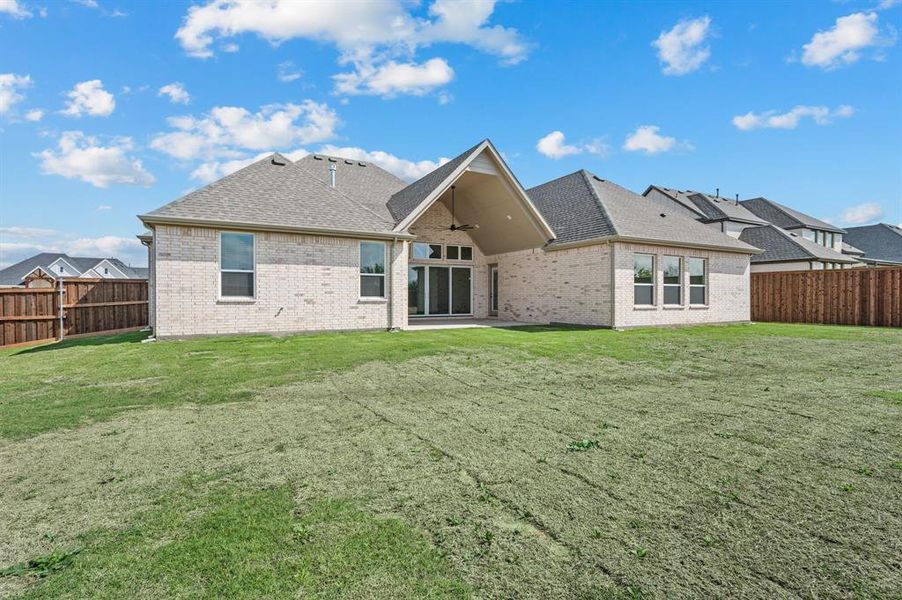 Exterior details and patio area of a home in NorthGlen, Haslet (Image 27).