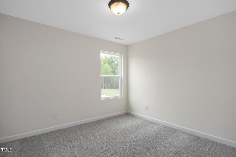 Spacious, unfurnished interior of a new home in Wellers Knoll, Lillington (Image 22).