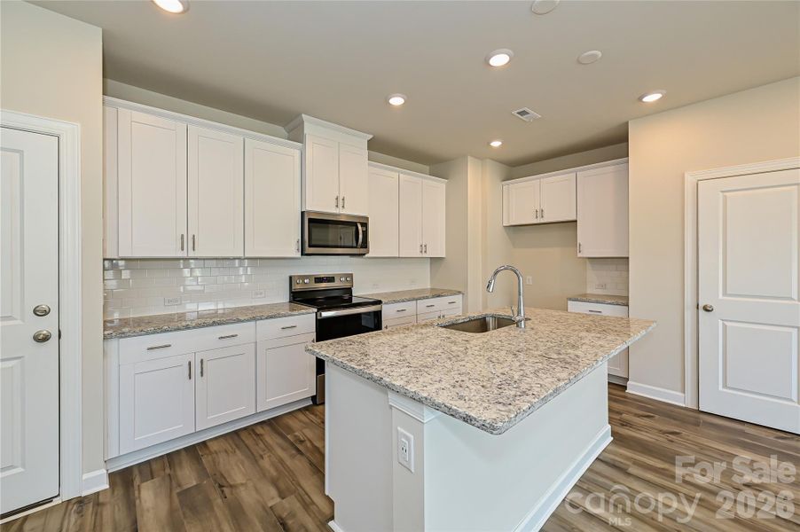 Photo is not of the actual home but is an inspirational photo of builder’s model home and may depict options, furnishings, and/or decorator features that are not included.